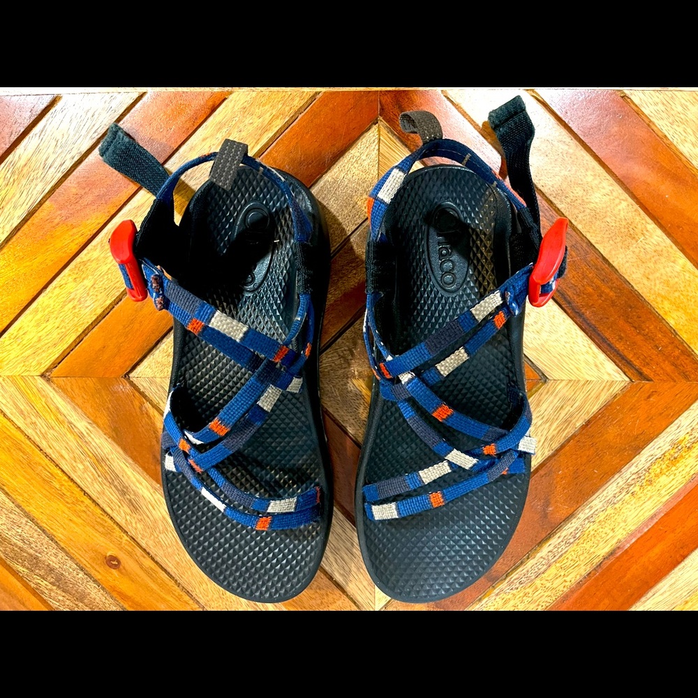 Kids Chacos size 4. Well loved but still have life in them!